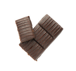 Pieces of hematogen bar on white background, top view