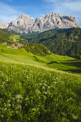 The Dolomites of Val Badia in the late afternoon of a summer day near the village of "La val", Italy - August 2021