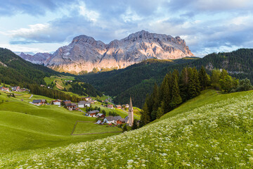 The Dolomites of Val Badia in the late afternoon of a summer day near the village of "La val", Italy - August 2021