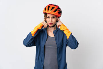 Young cyclist woman isolated on white background having doubts and thinking