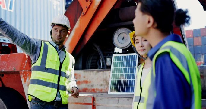 Electrical Engineer Technician is presenting solar panels for install in construction site or container for solar energy environmentally friendly. technology environment friendly alternative energy