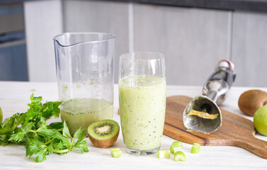 Making a fresh smoothie with a hand blender at home. Clean food, proper nutrition and drinks.