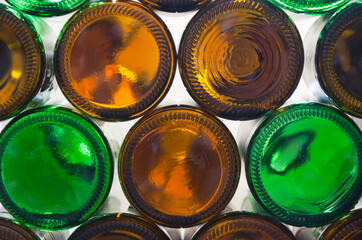 Bottom of the brown and green bottles