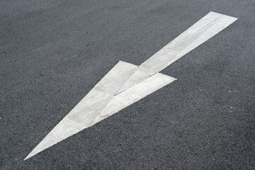 arrow on asphalt