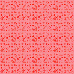 Seamless pattern with red hearts of different sizes on a pink background. Valentine's day background with seamless pattern. Valentine's Day decoration.
