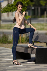 young fashionable woman in the cityscape