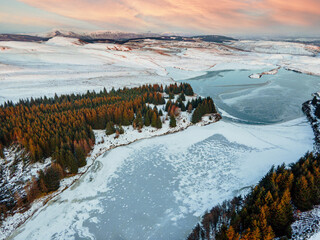 Snowy frozen winter lake - Scotland