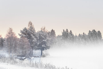 Dock in winter fog 