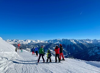 Skiers in winter resort Golm, Voralberg, Austria on a sunny day.