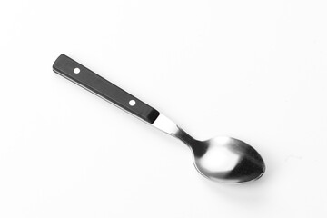 Beautiful teaspoon isolated on a white background. Cutlery on a white background