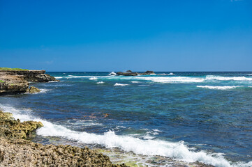 uninhabited island in the caribbean and atlantic ocean on the border