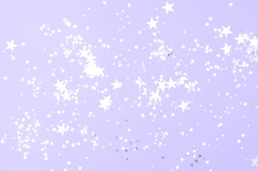 Fototapeta na wymiar Background with confetti stars trendy purple 2022 .