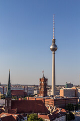Aerial view of Berlin skyline with famous TV tower at Alexanderplatz and at sunset, Germany