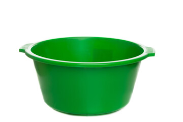 green plastic basin isolated on white background