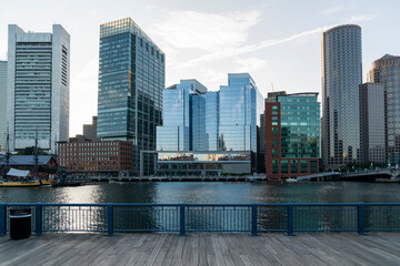 Obraz na płótnie Canvas Panoramic picturesque city view of Boston Harbour and Seaport Blvd at day, Massachusetts. An intellectual, technological and political center. Building exteriors of financial downtown.