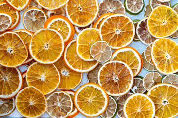 Fototapeta na wymiar dried citrus fruits, dried oranges close-up view, macro photo, space for text, blank for design, background image of dried oranges