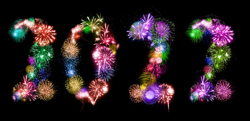2022 New Year. Two thousand twenty two Happy New Year. Numbers are made of holiday fireworks over...