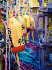 colourful lobster buoys at a harbor in Prince Edward Island