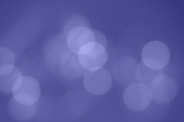 abstract bokeh background, defocused blurred lights toned in purple
