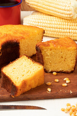 Typical sliced corn cake on cutting board.