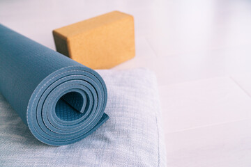 Yoga mat, cork block and linen meditation cushion. Natural organic material props for wellness...