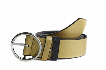 Multicolored leather belts on a white background.