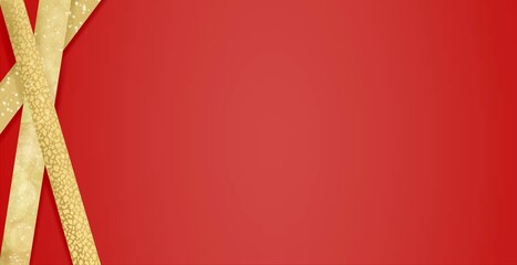 red and gold ribbons on red background greetings celebrating christmas  © Joanna