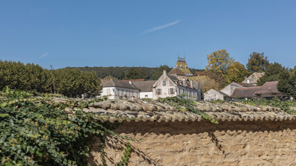 Fototapeta na wymiar Looking over a wall at a Burgundy village