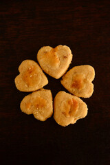 heart shaped cookies on dark background, baker's day,  view from above, brazilian snacks, valentine's day, dark background, homemade cookies, food background