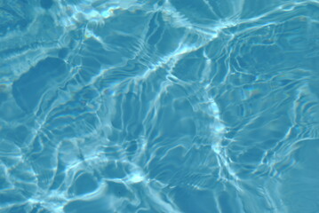 Solar glare on the water in the pool.blue