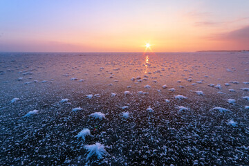 dawn on an icy lake, dawn winter morning winter landscape