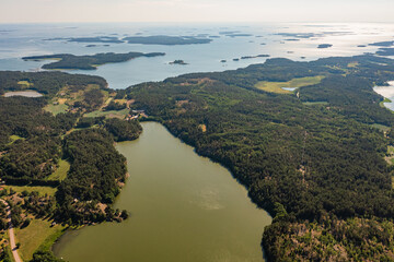 Photo from a drone, on a sunny summer day, a view of the islands in the sea. Finland, Turku. Nature and landscape of Scandinavia