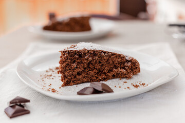 Delicious chocolate cake on plate on table.Vegan cake