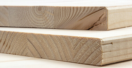 White pine board structure, photographed from profile.