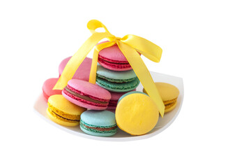Close-up of colorful macaroons on white plate