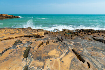 Sandstone formations on the beach of Luz on the Algarve, Portugal.