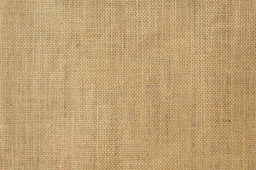Yellow burlap background. Free space for text.