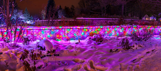 Winter holiday wall at night in park forest