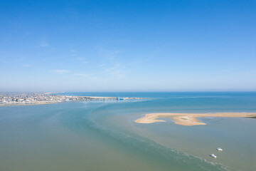 Fototapeta na wymiar The bay of Orne and the city of Ouistreham in Europe, France, Normandy, in summer on a sunny day.