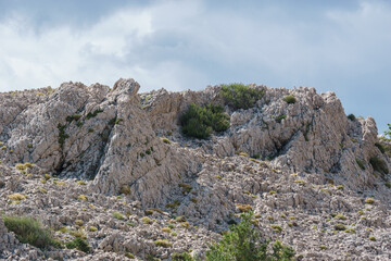 Detail of karst landscape of island of Krk on a sunny day, Croatia