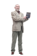 elderly business man with a calculator. isolated on a white