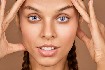 Fototapeta premium Natural beauty. Beautiful young woman. Smooth skin care concept.