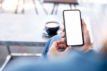 cell phone blank white screen mockup.hand holding texting using mobile on desk at office.background empty space for advertise.work people contact marketing business,technology