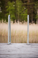 Swimming latter by lake 