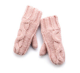 Knitted mittens on white background