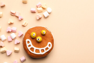 Fototapeta na wymiar Funny cookie with marshmallows on light background