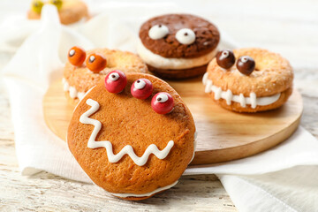 Funny cookies for Halloween on table