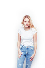 young pretty stylish blond hipster girl posing emotional isolated on white background happy smiling cool smile, lifestyle people concept