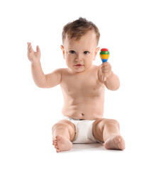 Little baby boy with rattle on white background