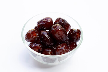 Sweet chinese jujube dessert in glass bowl on white background.